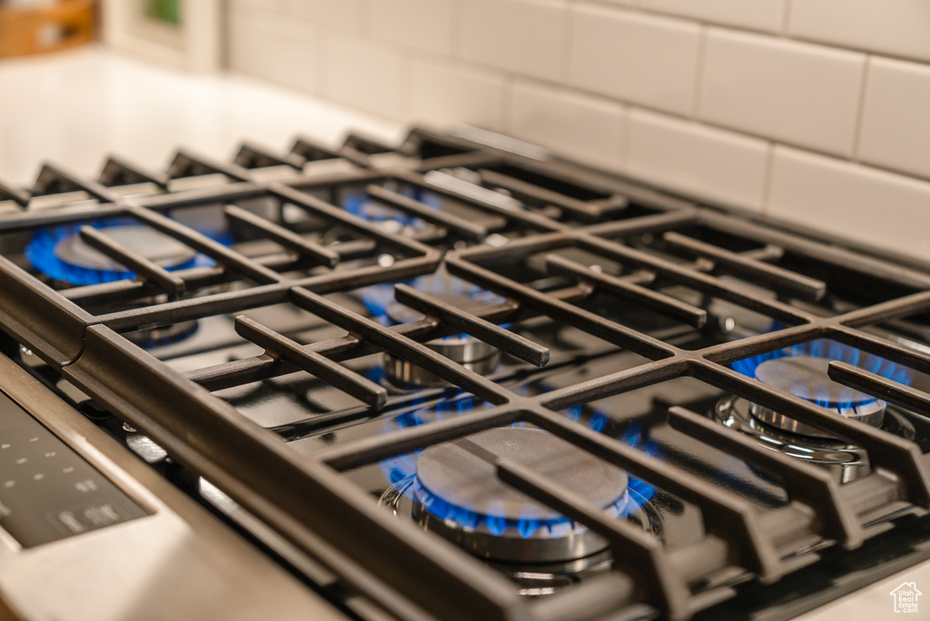 Kitchen view of gas range and stovetop