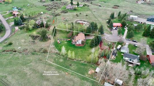 View of property location with property boundaries highlighted and rural landscape