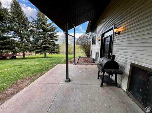 View of patio featuring grilling area