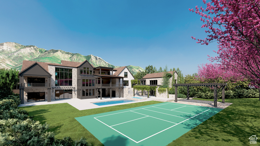 View of home\'s community with a pergola, a patio, a lawn, and a mountain view