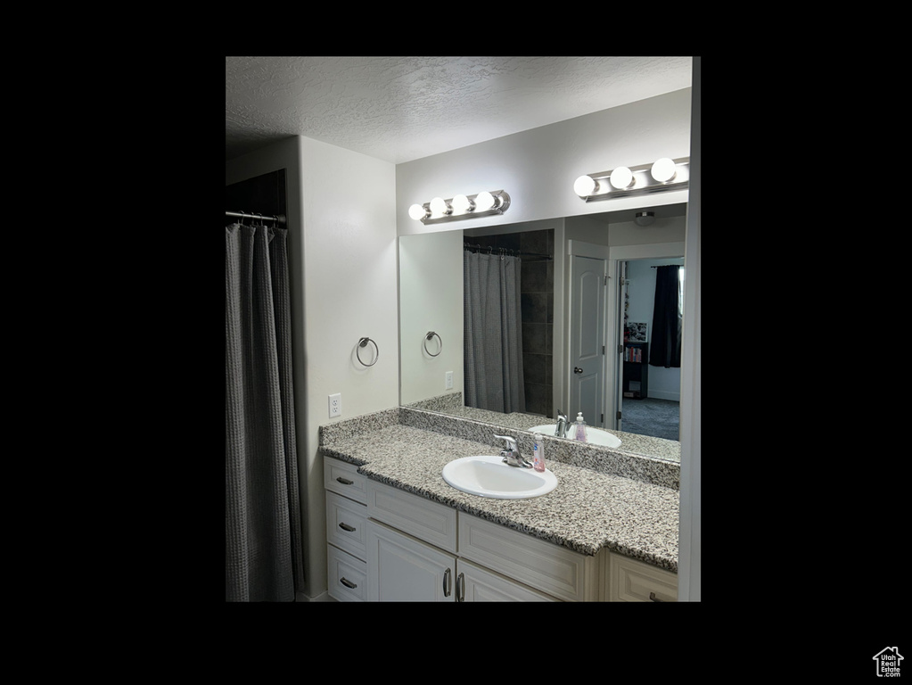 Full bath with vanity