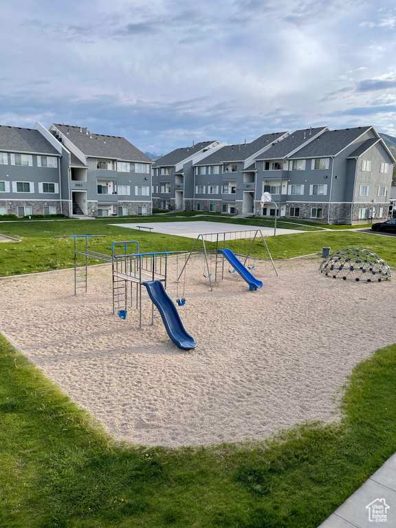 Surrounding community featuring a residential view and a yard