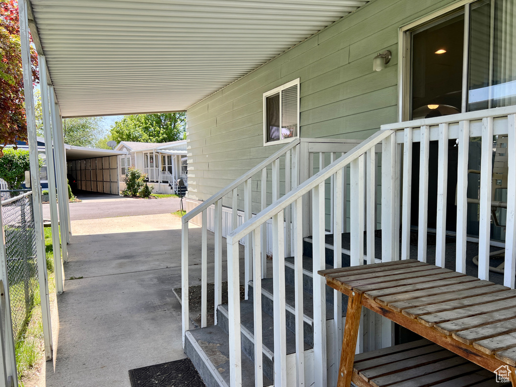 View of patio / terrace featuring a carport