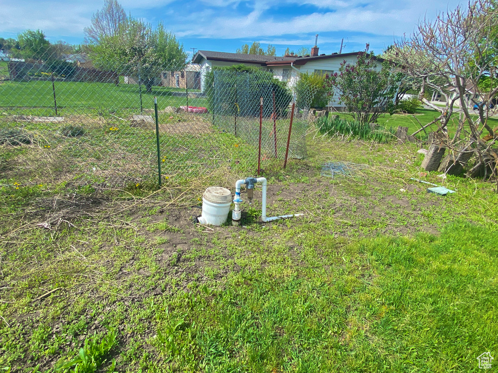 View of yard with fence