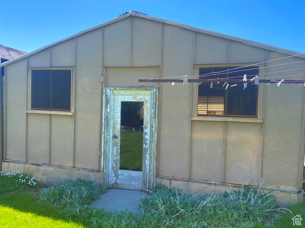 View of side of property featuring board and batten siding