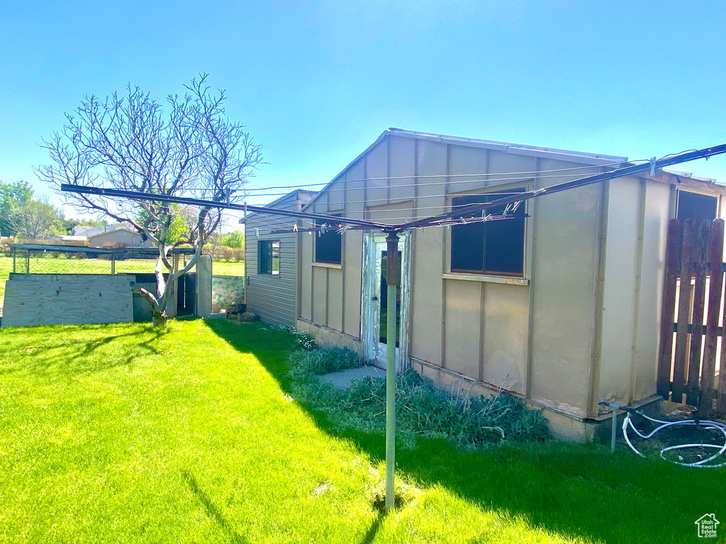 View of side of property featuring board and batten siding