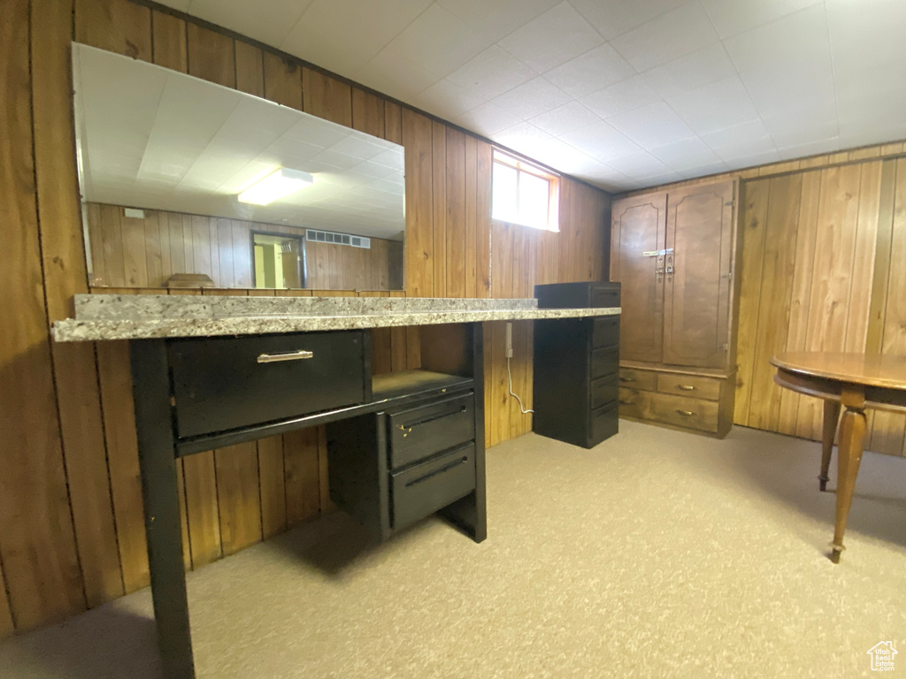 Unfurnished office with wood walls