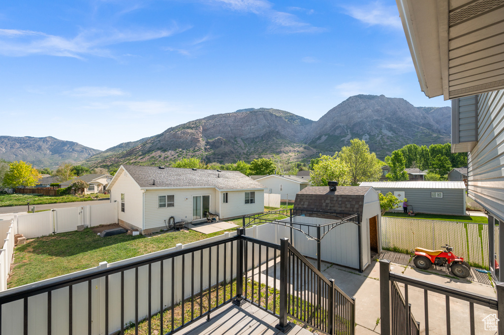 Balcony with a mountain view and a residential view