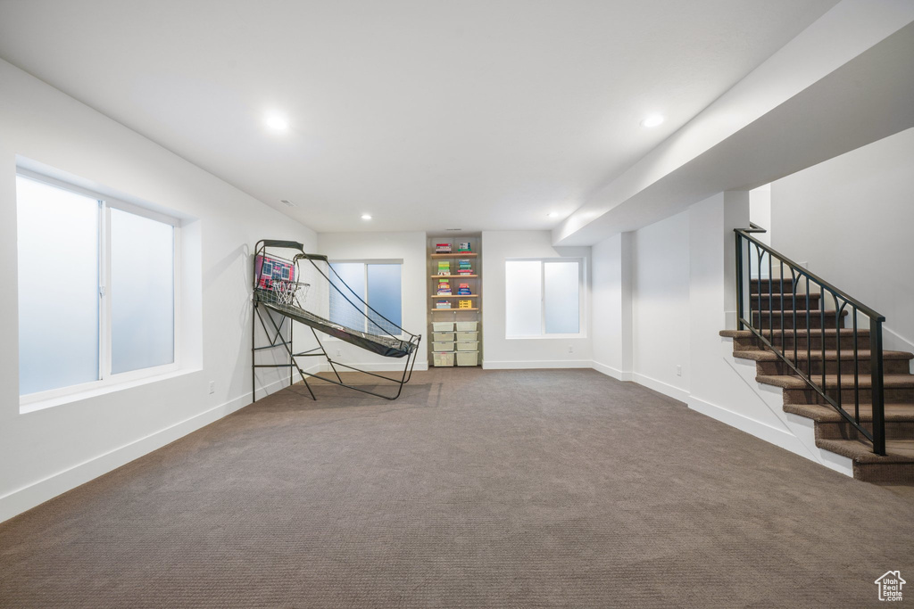 Rec room featuring carpet flooring, baseboards, and recessed lighting