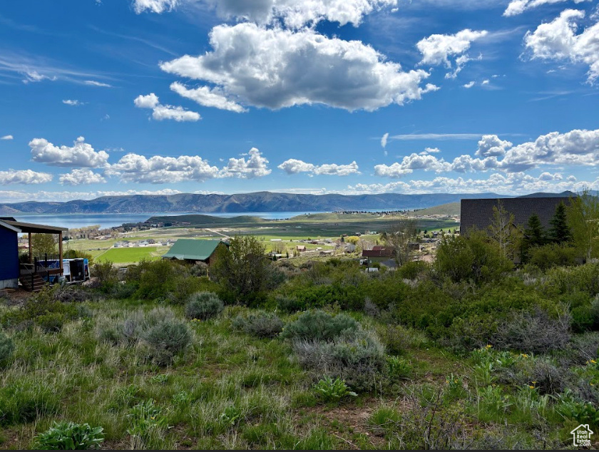 View of mountain background featuring a nearby body of water
