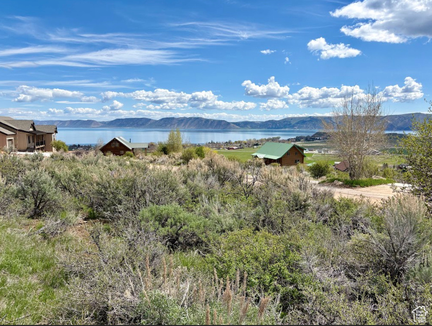 View of mountain background featuring a nearby body of water