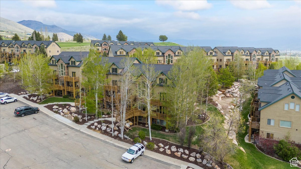 Birds eye view of property featuring a residential view and a mountain view