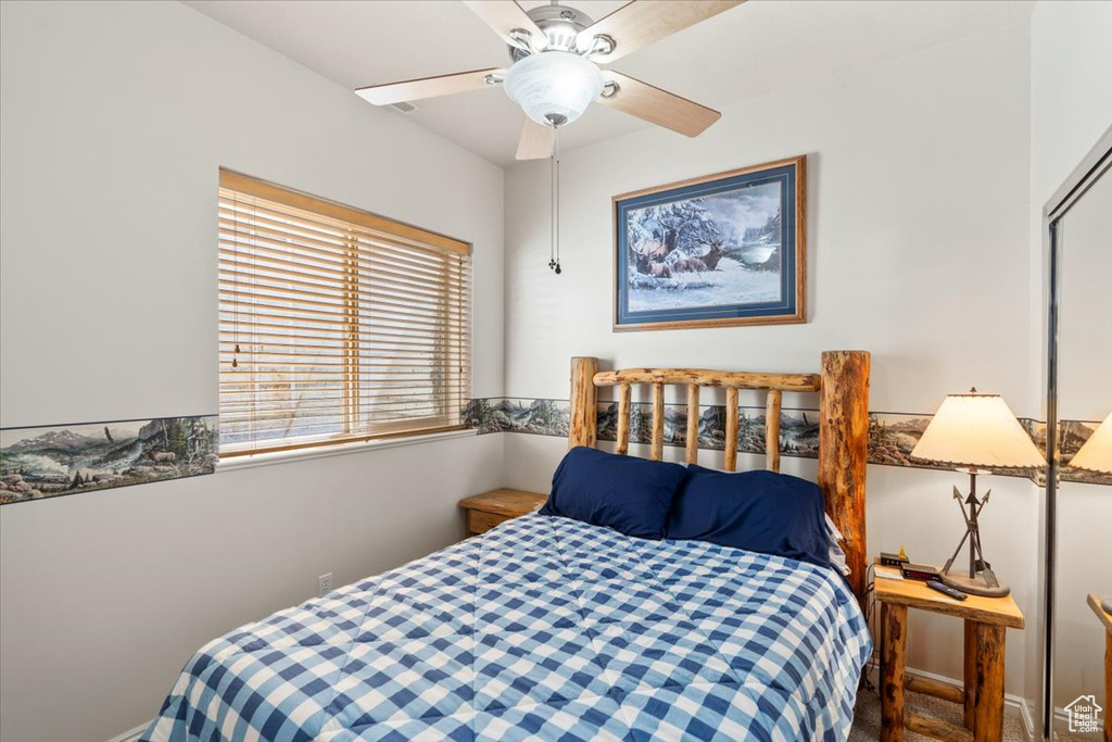 Bedroom with a ceiling fan