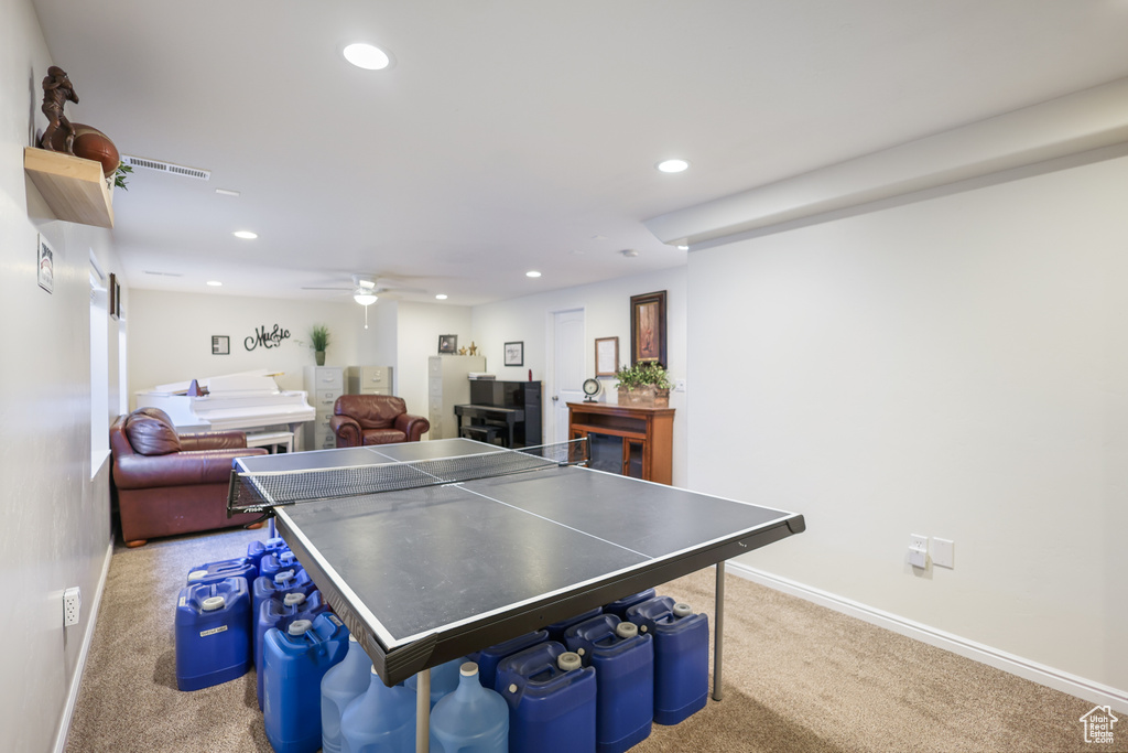 Game room with carpet, recessed lighting, baseboards, and a ceiling fan