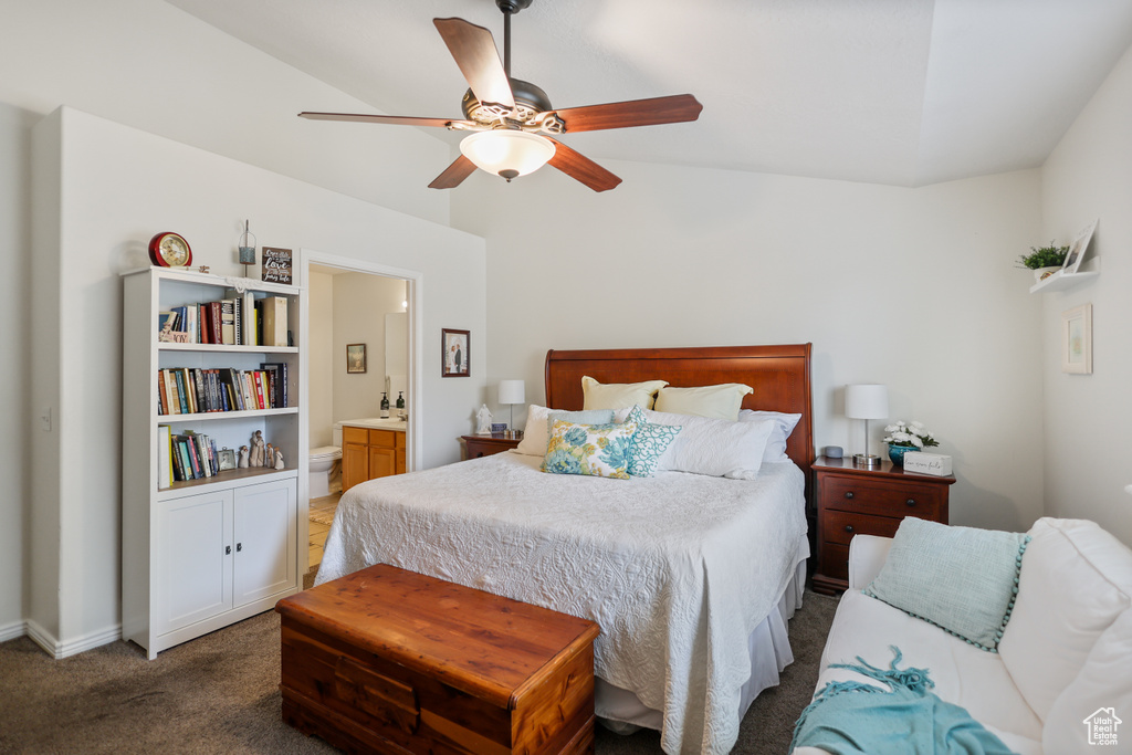 Bedroom featuring carpet, ensuite bath, and ceiling fan