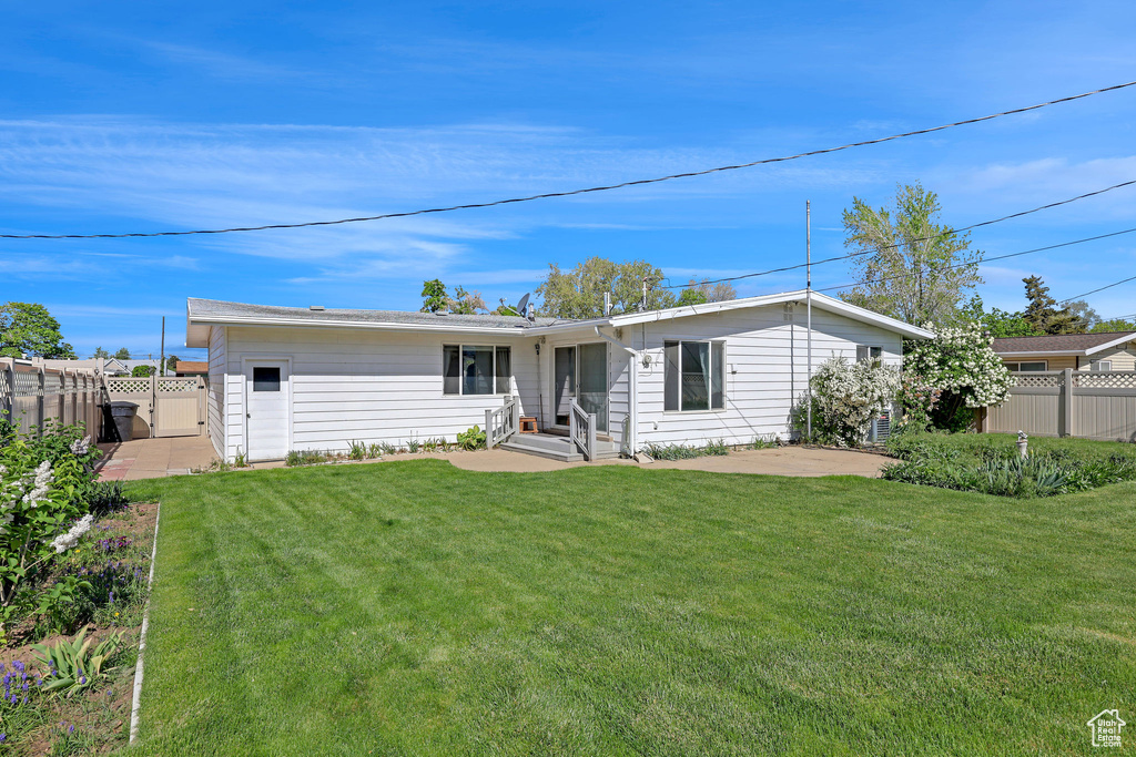 View of front of home with a patio