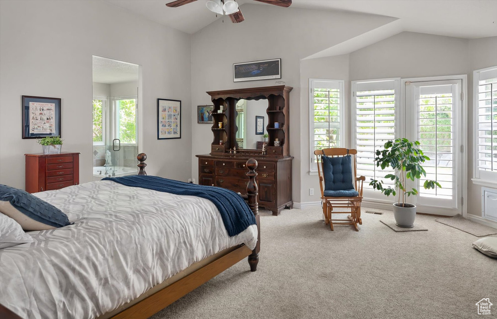 Bedroom with carpet flooring, multiple windows, vaulted ceiling, a ceiling fan, and baseboards