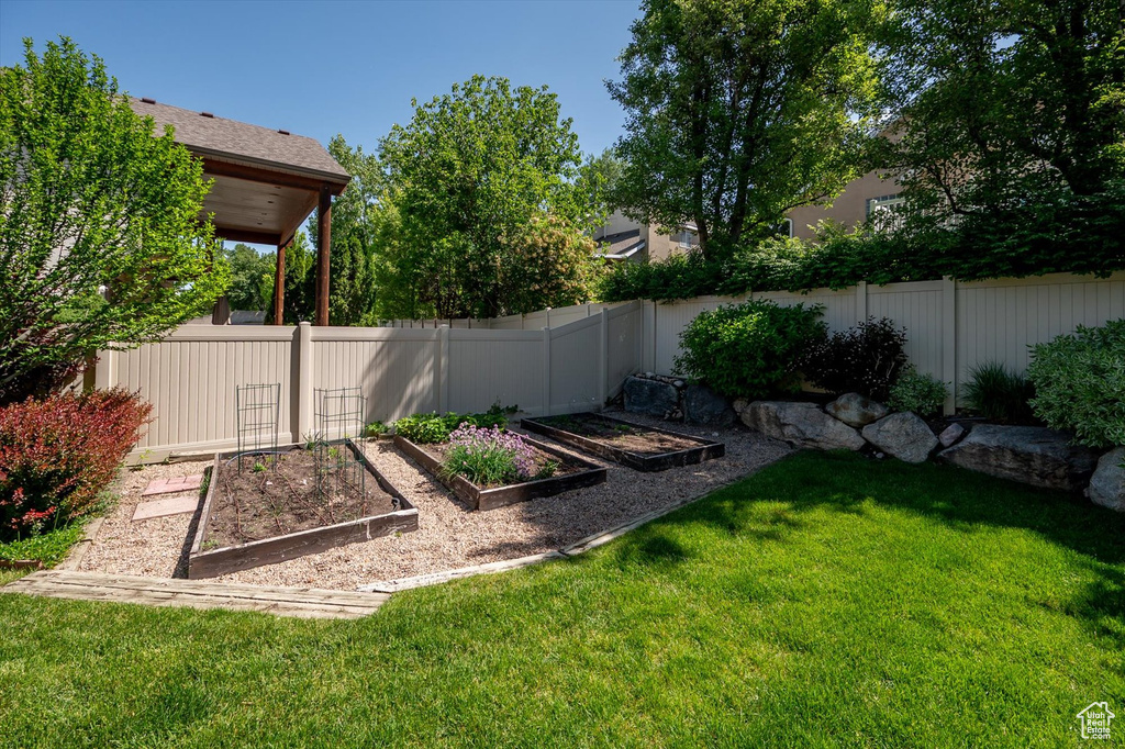 View of yard featuring a vegetable garden