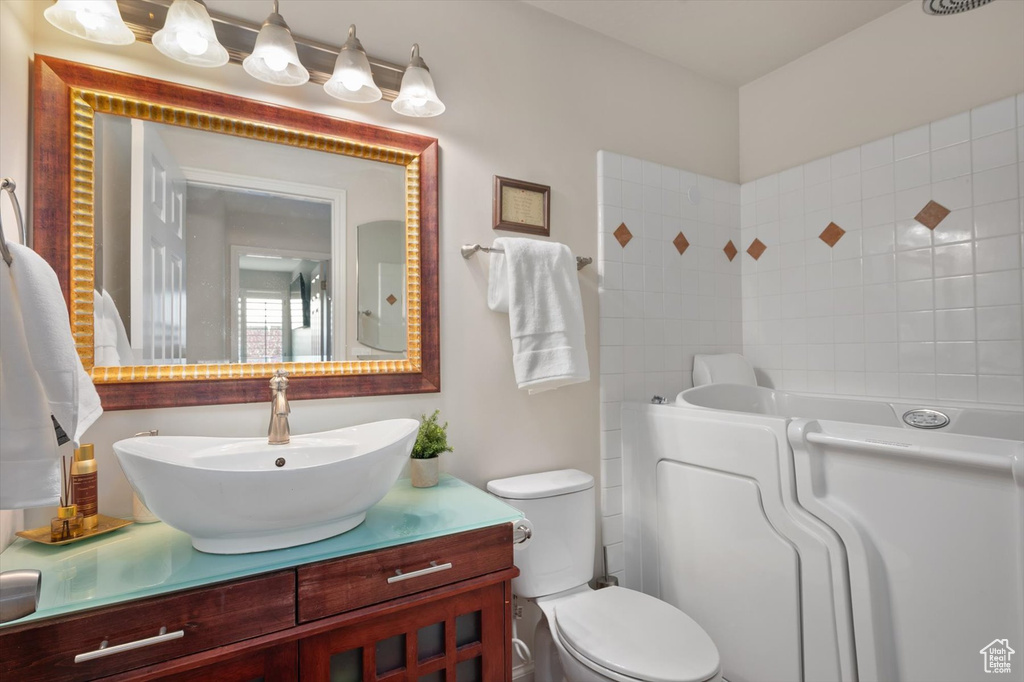 Bathroom with vanity and toilet