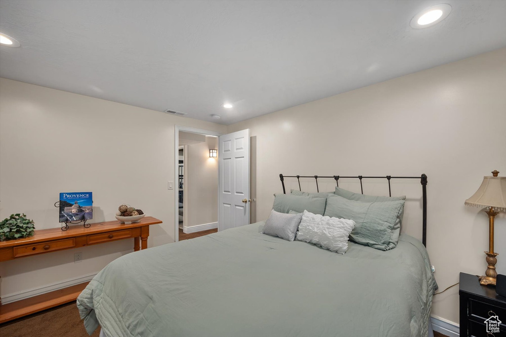 Bedroom featuring recessed lighting and baseboards