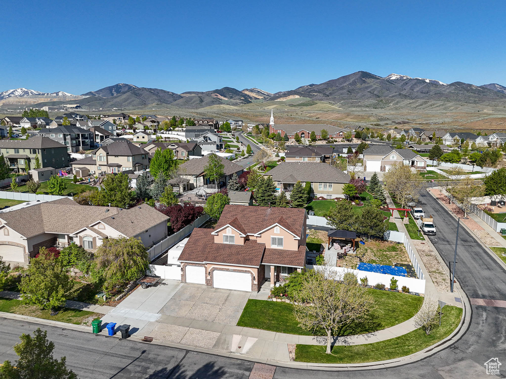 Aerial view of residential area with mountains