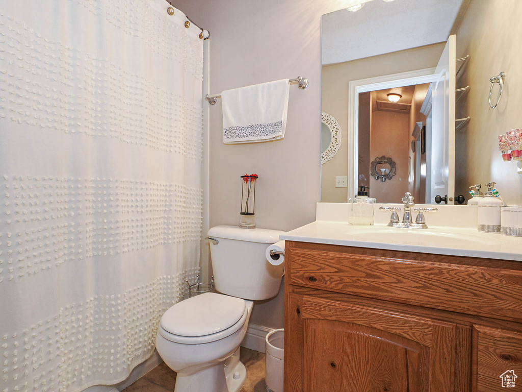 Bathroom with toilet and vanity