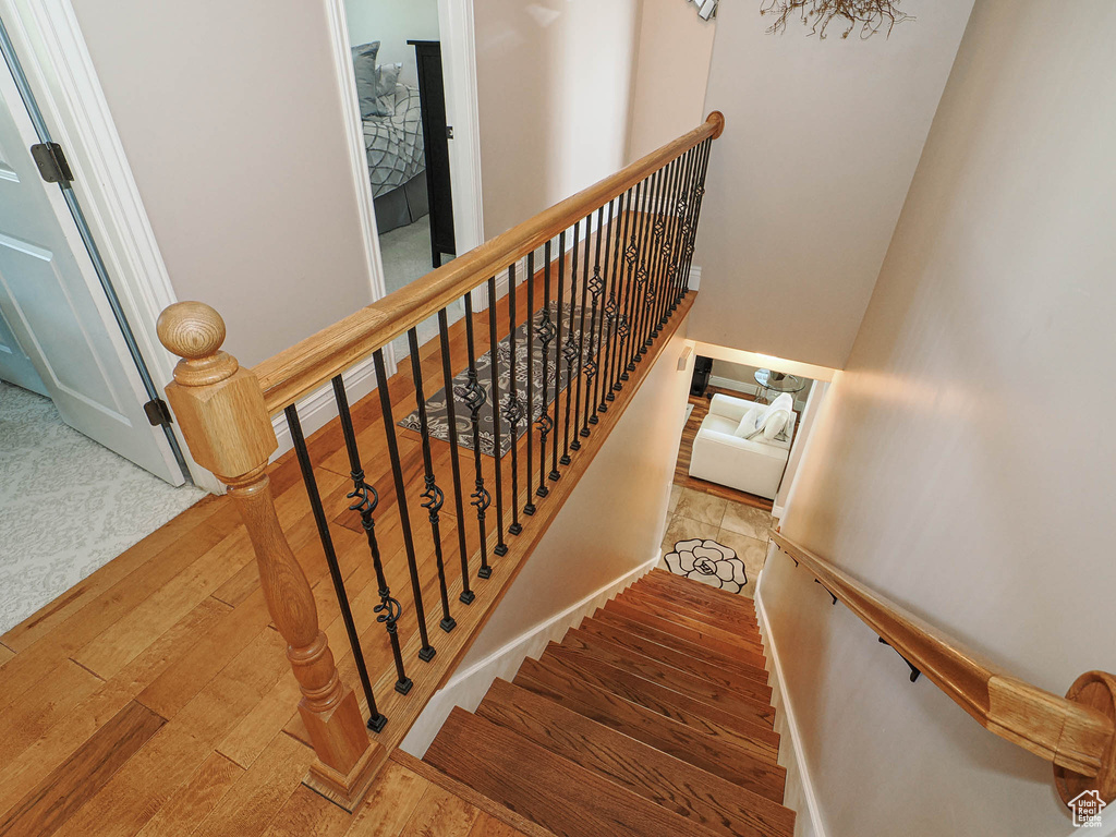 Stairway with wood finished floors