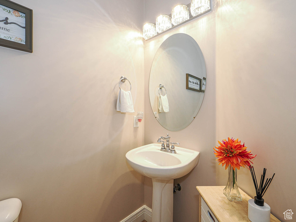 Half bathroom featuring toilet