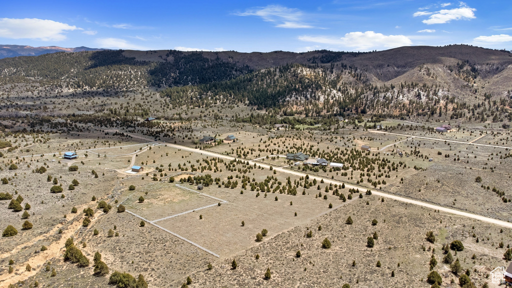 View of mountain backdrop featuring a desert landscape and rural landscape