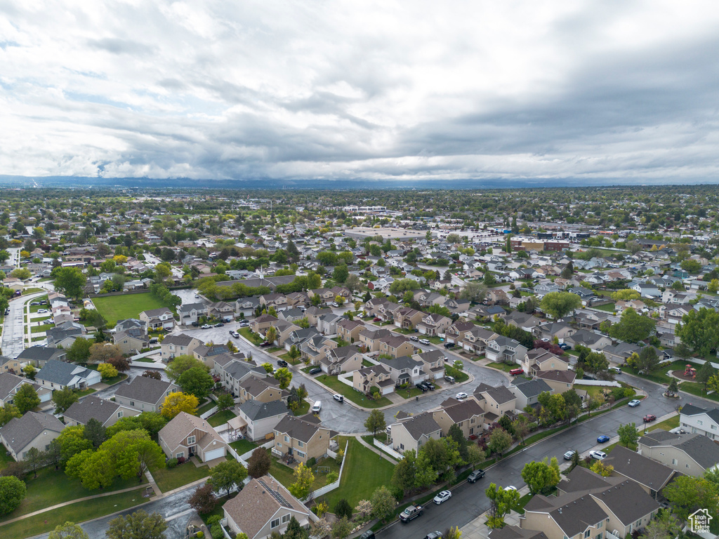 Aerial overview of property\'s location featuring nearby suburban area