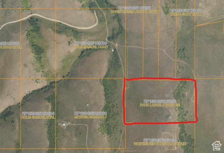 Aerial map of property and surrounding area with property parcel outlined