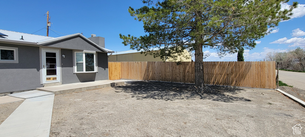 View of yard with fence