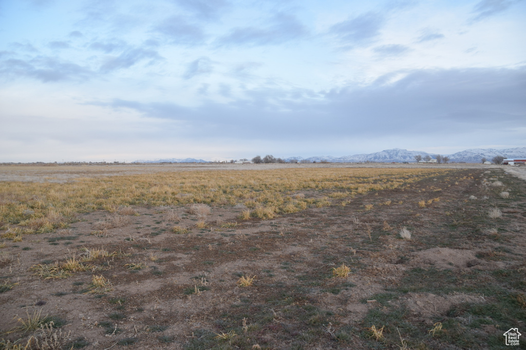 View of yard with a view of countryside and a mountain view