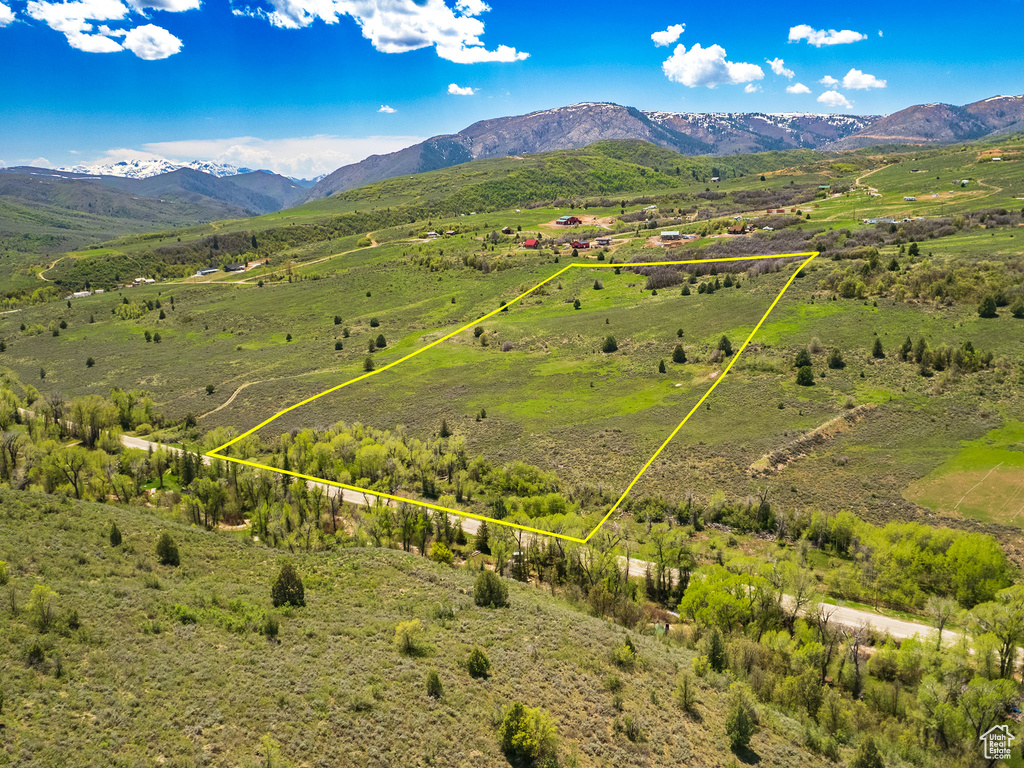 View of property location with property boundaries highlighted and a mountain backdrop