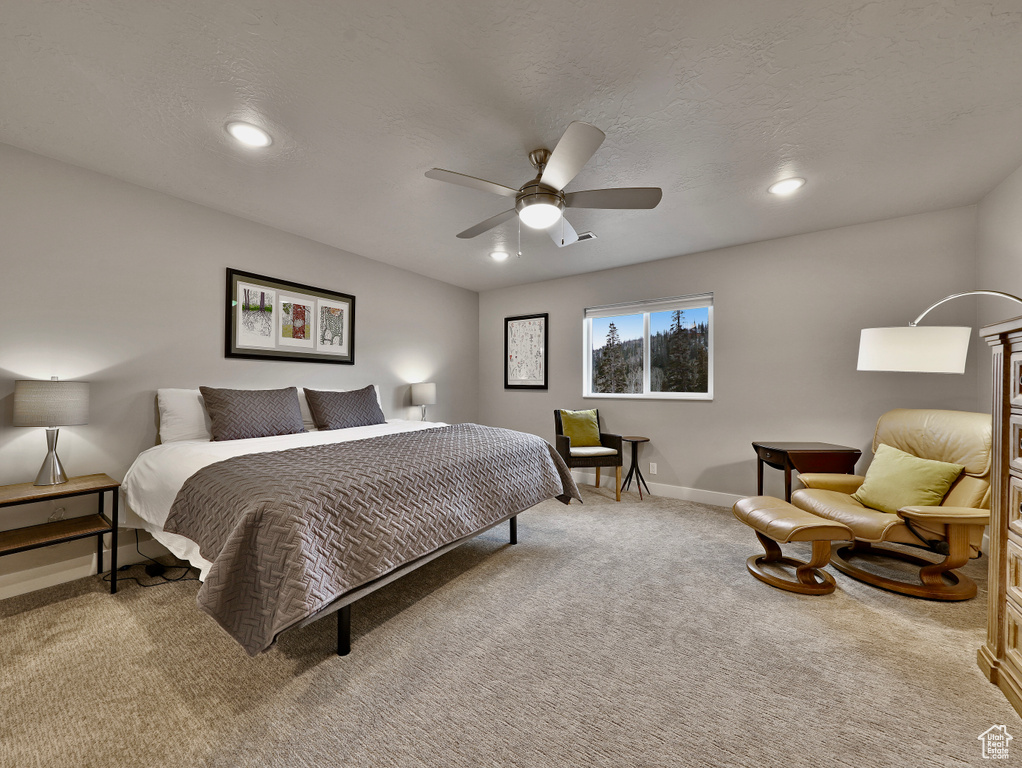 Bedroom with carpet, baseboards, ceiling fan, and recessed lighting
