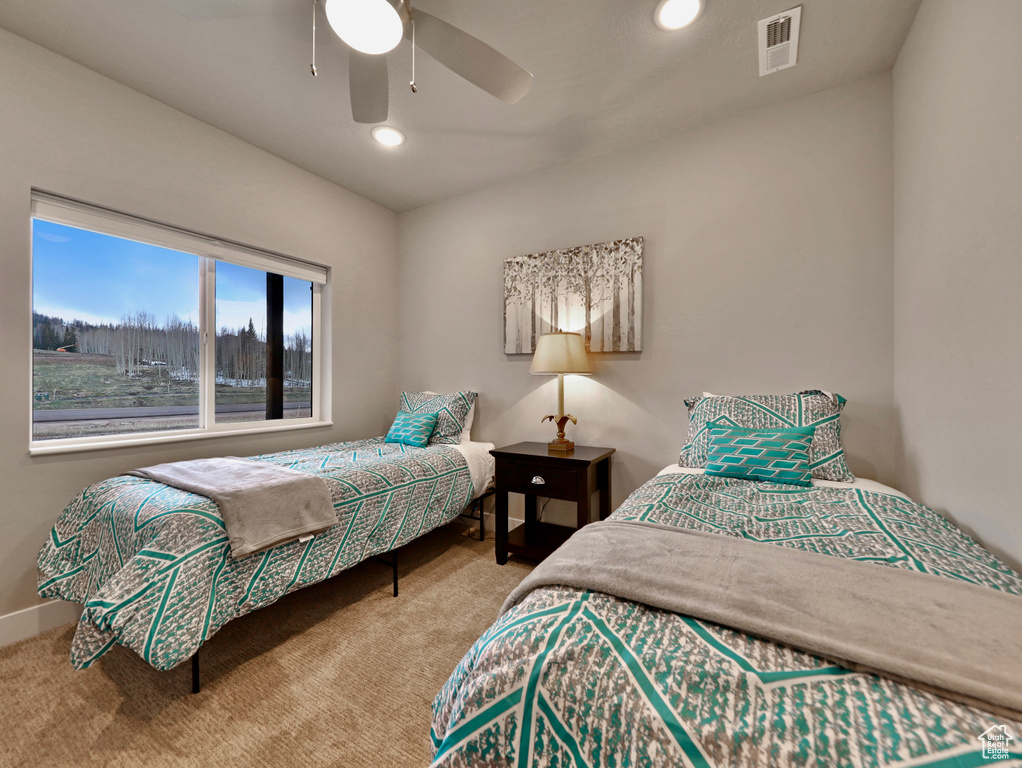 Bedroom with carpet floors, a ceiling fan, recessed lighting, and baseboards