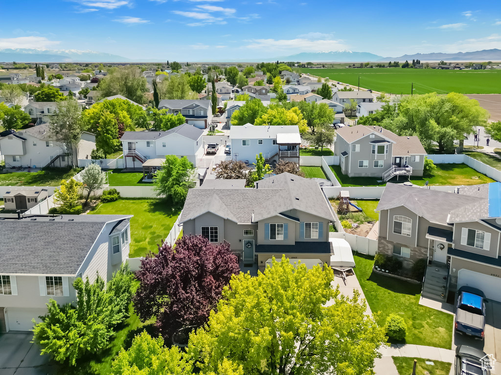 Aerial view of residential area with a mountain backdrop