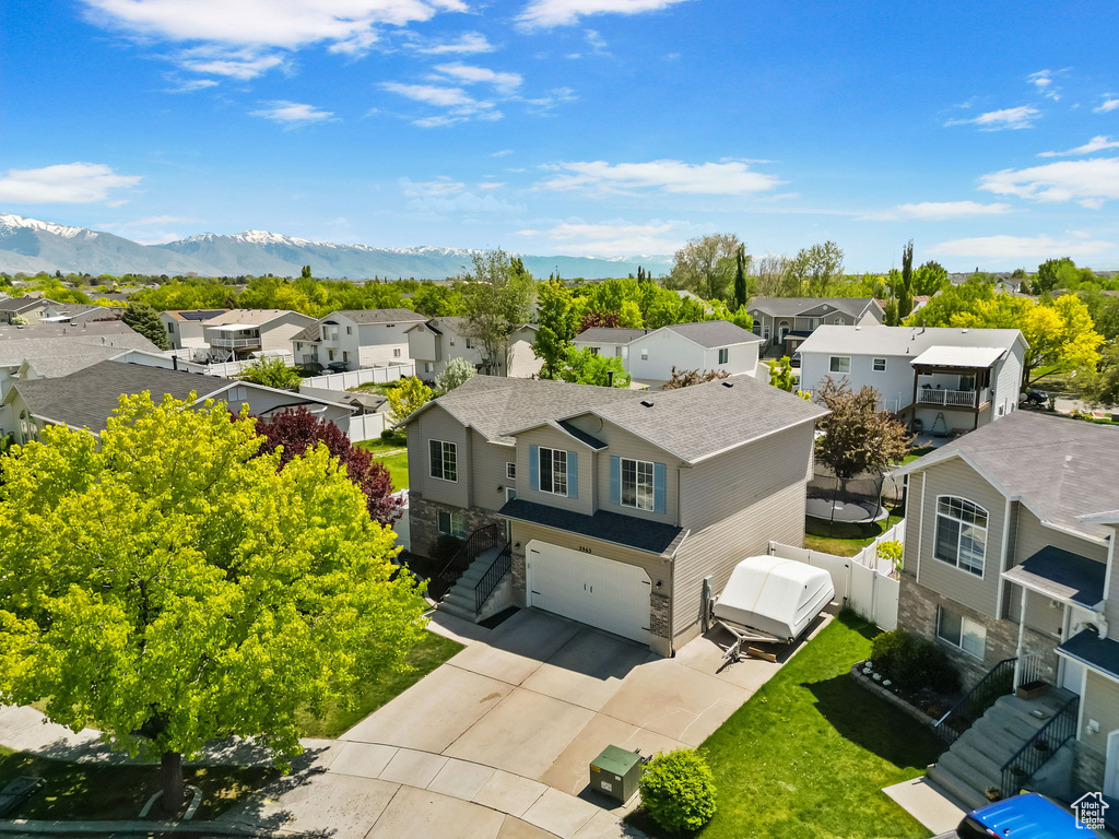 Aerial view of residential area with mountains
