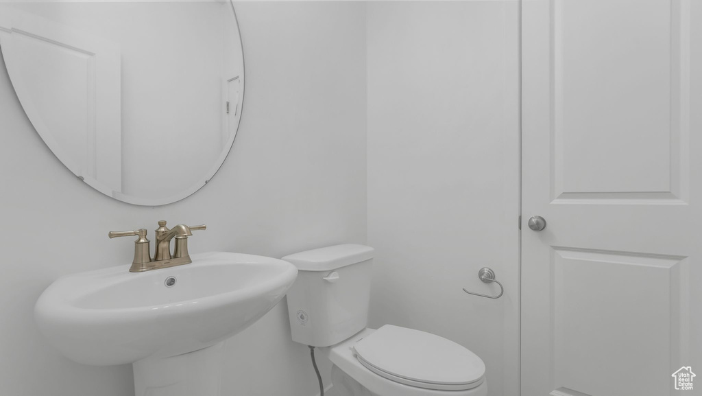 Bathroom with a sink and toilet