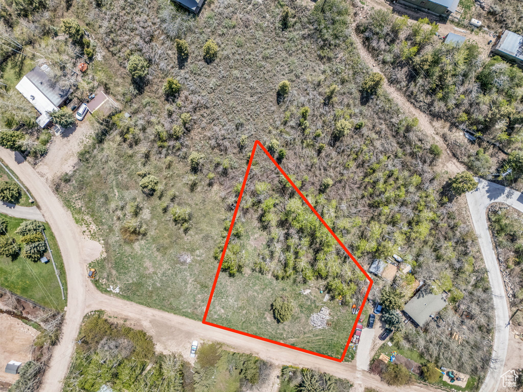 Aerial view of property\'s location with property parcel outlined