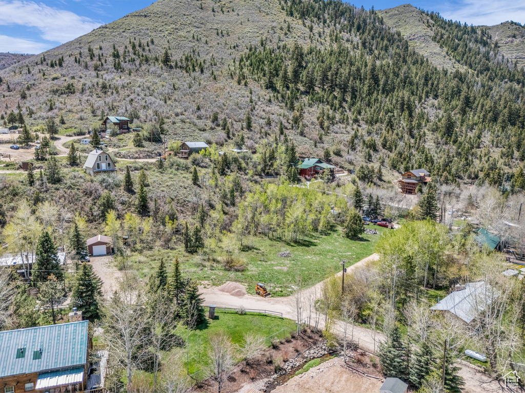 Aerial view of property\'s location with mountains