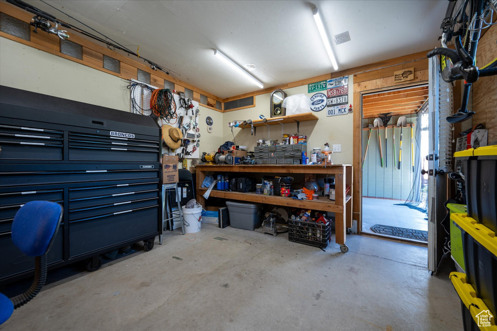 Garage featuring a workshop area