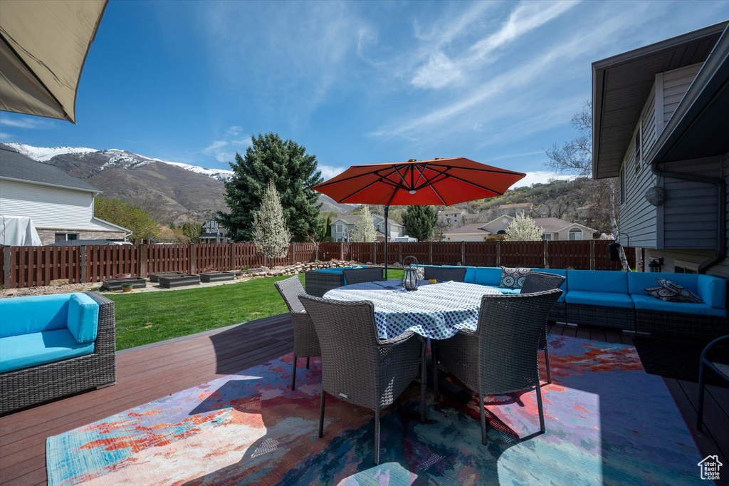 View of patio / terrace featuring an outdoor hangout area, a deck with mountain view, and outdoor dining area
