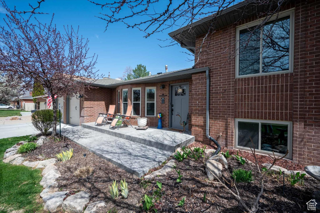 View of front of property featuring brick siding