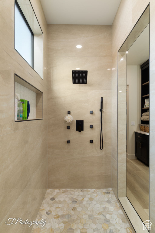 Bathroom featuring tiled shower