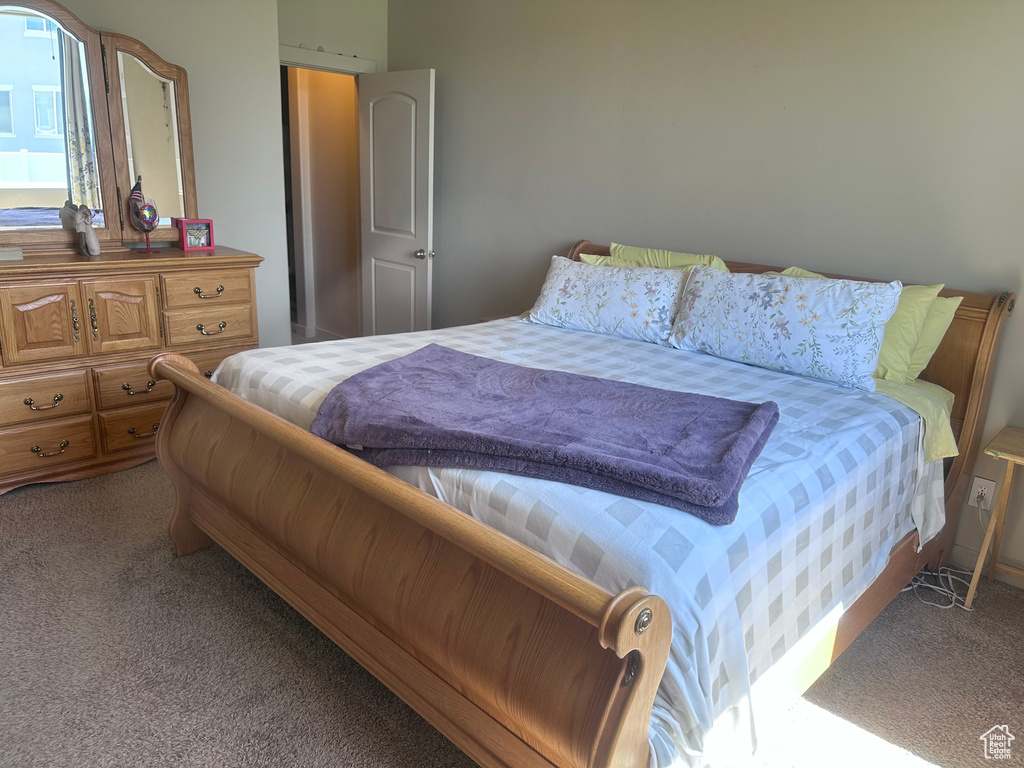 Bedroom featuring carpet floors