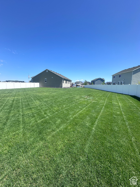 View of yard with fence