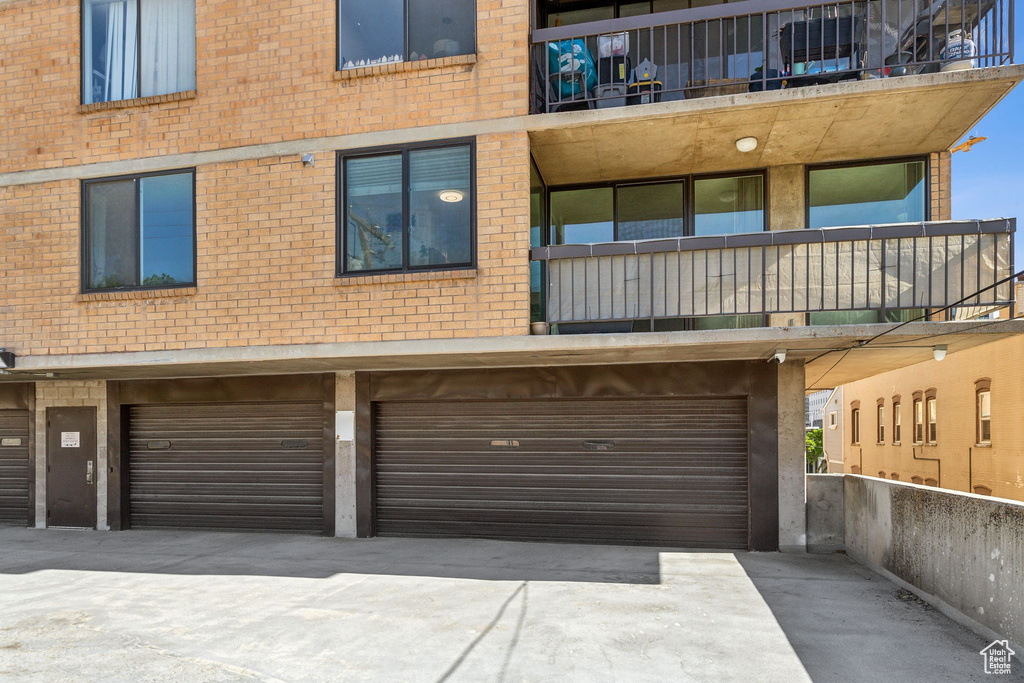 Garage with concrete driveway