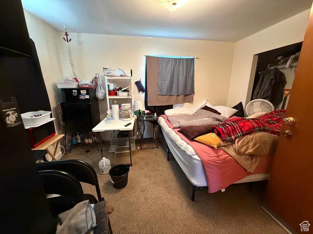 View of carpeted bedroom