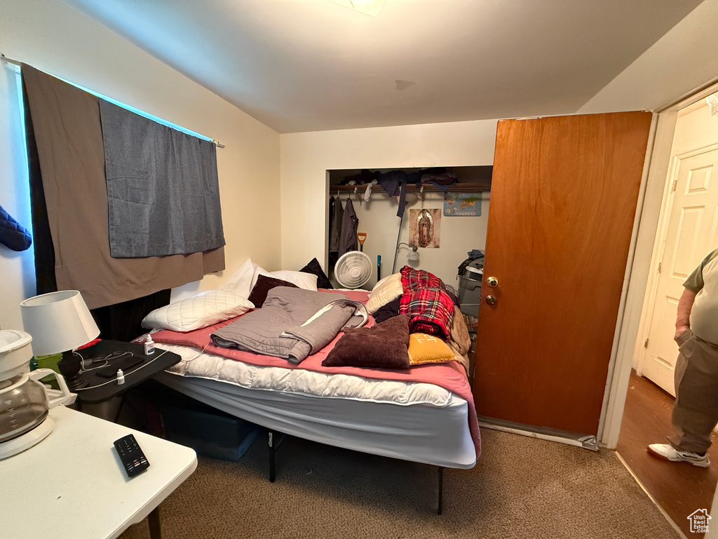 Bedroom featuring carpet floors